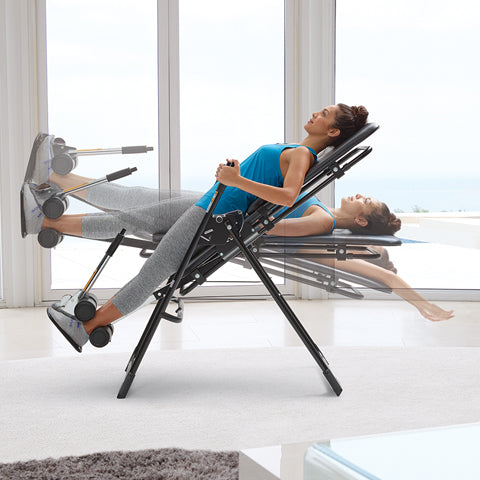 A woman using an inversion table.
