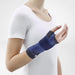 Woman in workout attire with the ManuTrain Wrist Brace wrapped on her right hand.
