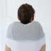 Back view of woman using the JohnsonWellness Quzy Neck Massager on her neck