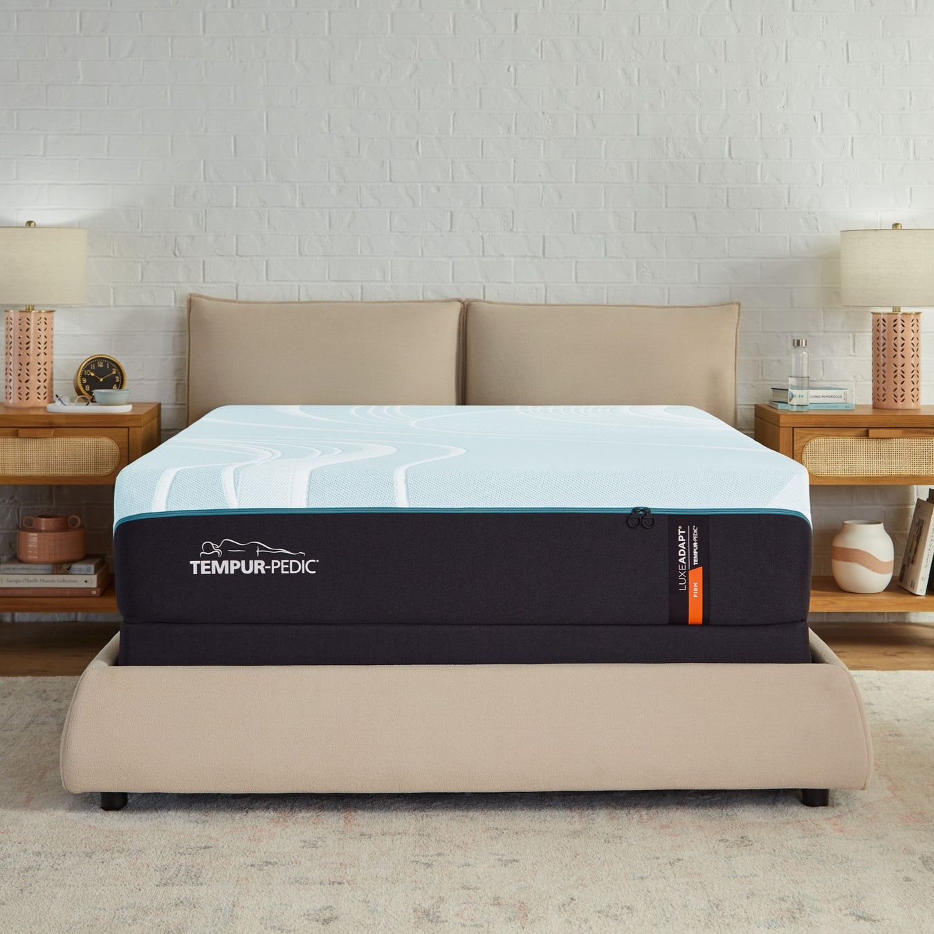 An image of two Tempur Pedic mattresses stacked on top of eachother.