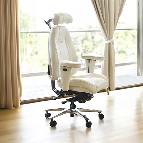 A Mid Back Ultimate Executive ergonomic office chair by Lifeform in premium leather white with an adjustable headrest and chrome base.