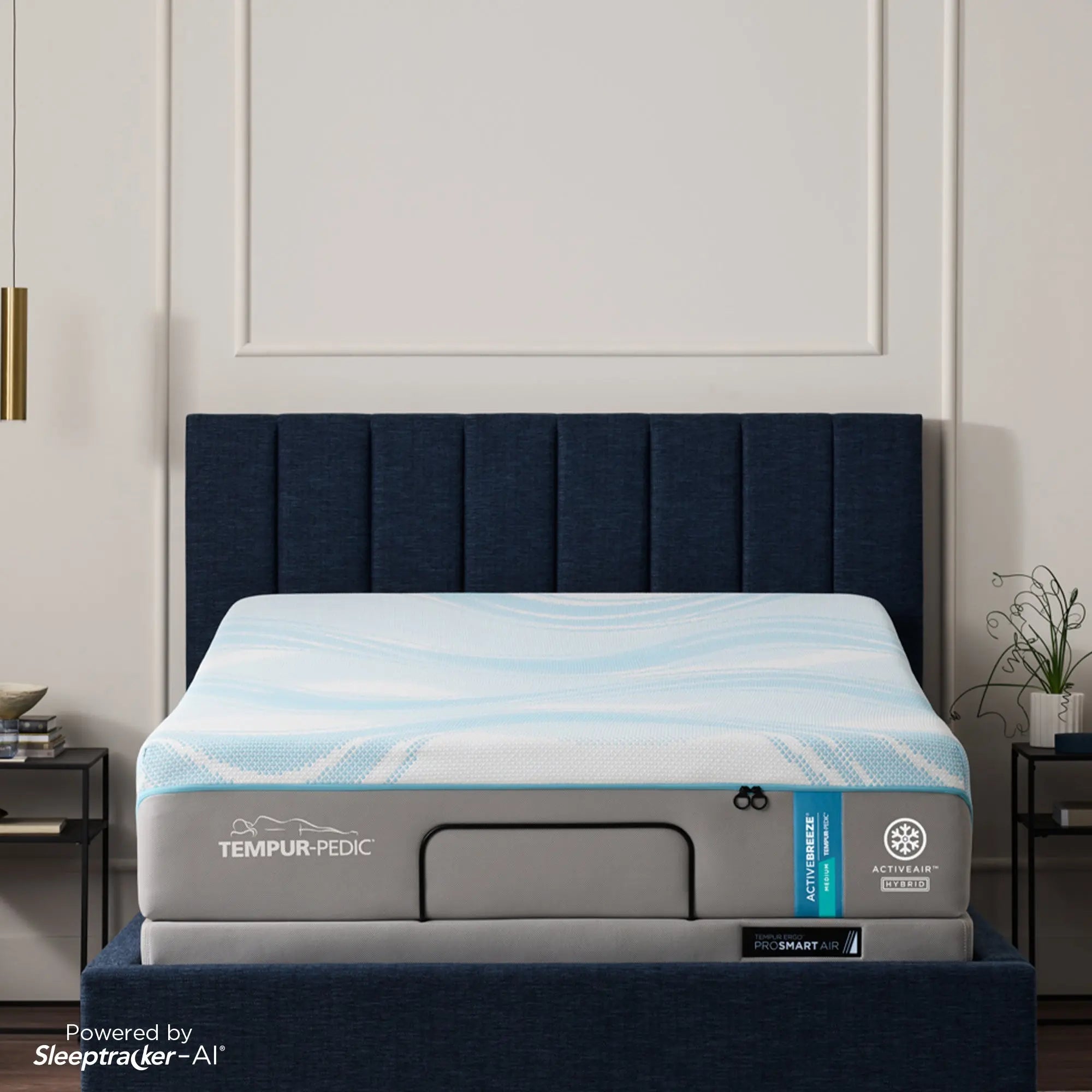 An image of two Tempur Pedic mattresses stacked on top of eachother.