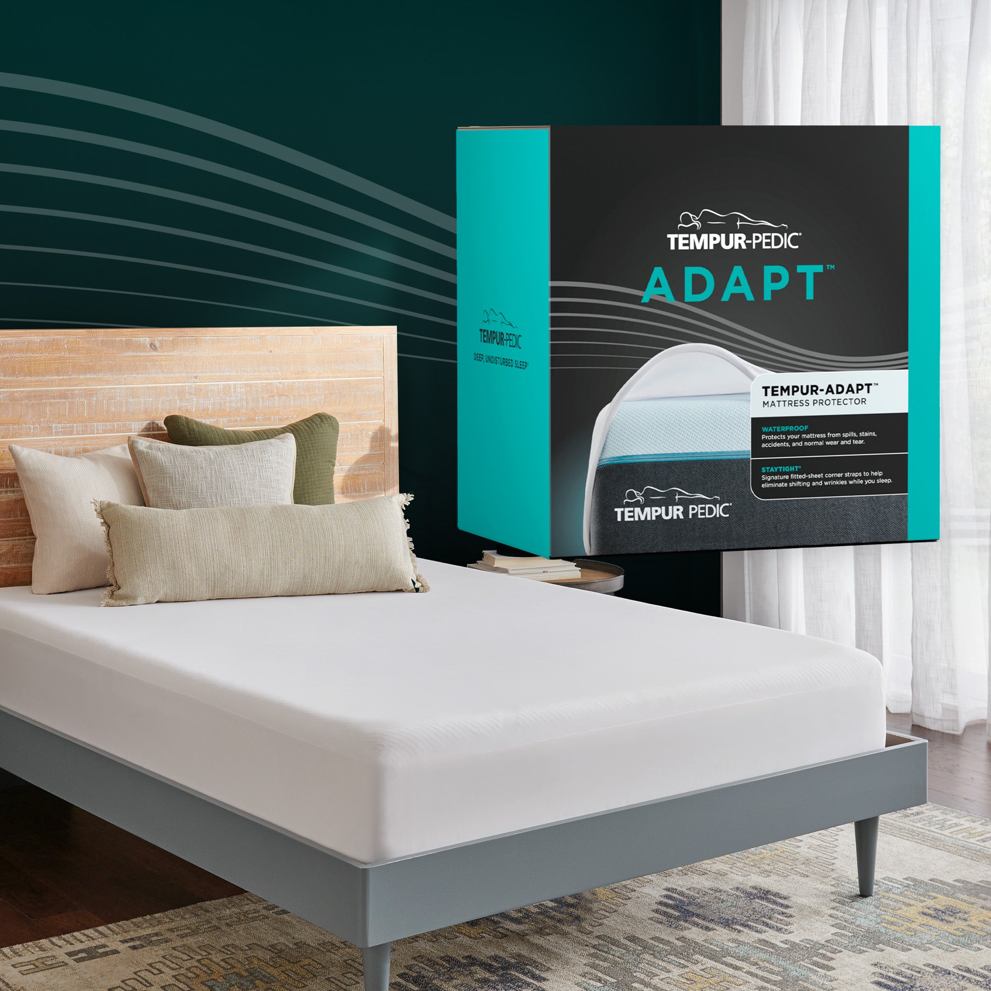 Tempur-Pedic Adapt packaging on a bed in a bedroom setting