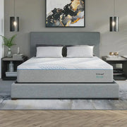 Gray mattress with 'Technogel' branding on a bed in a modern bedroom setting.