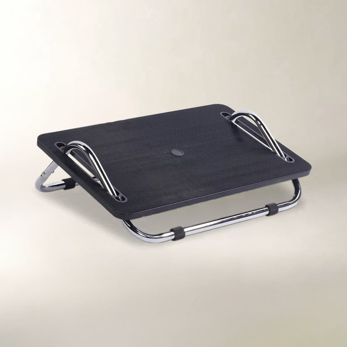 A black footrest with a silver metal frame, shown on a light beige background.
