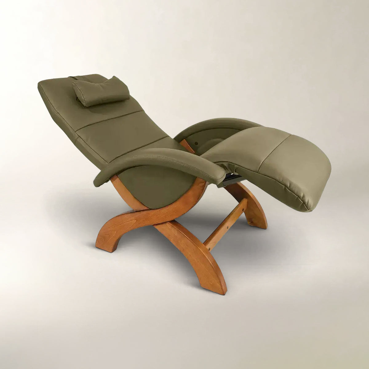 An olive green leather recliner chair with a curved wooden base, shown on a neutral light gray background.