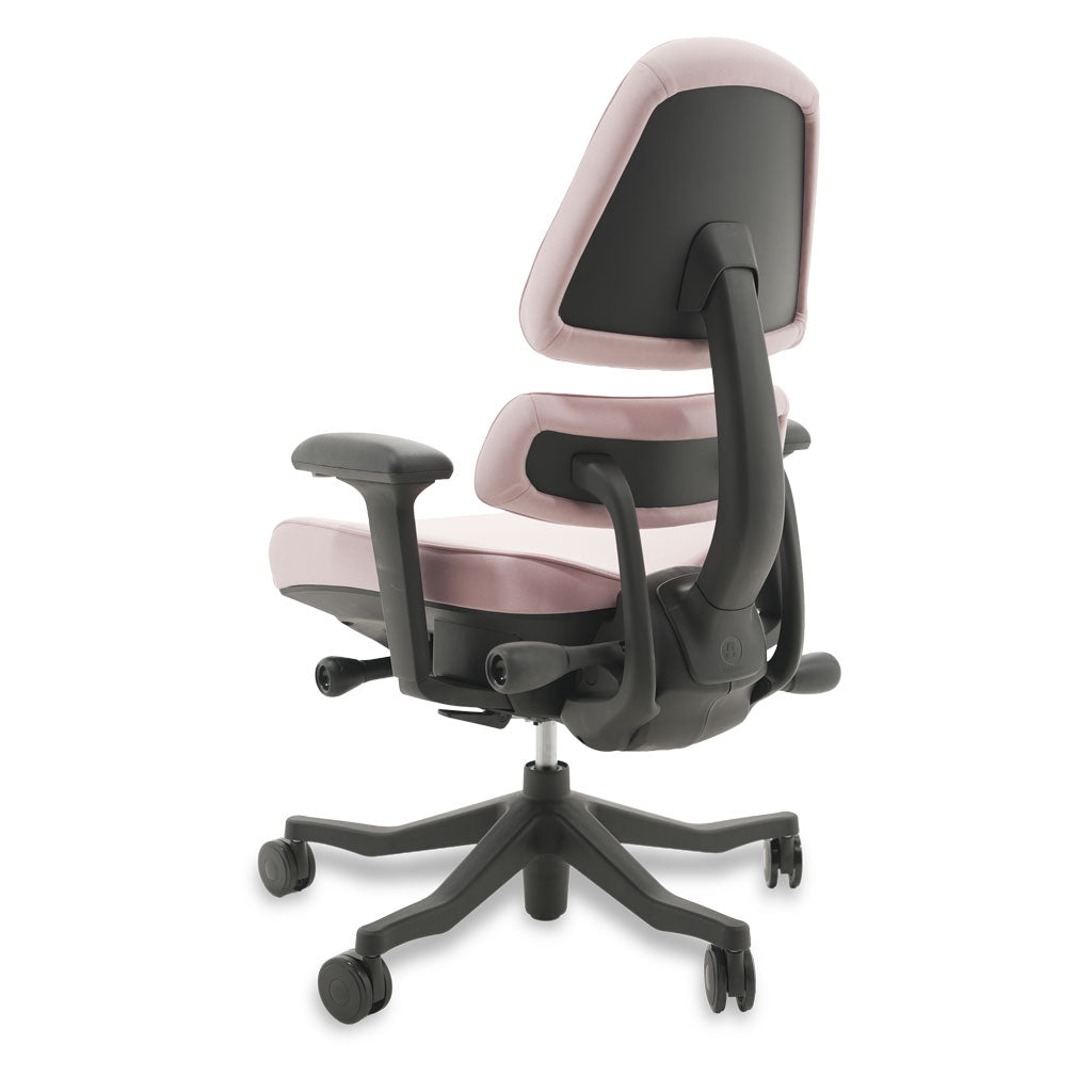 Black and pink ergonomic chair on a white background