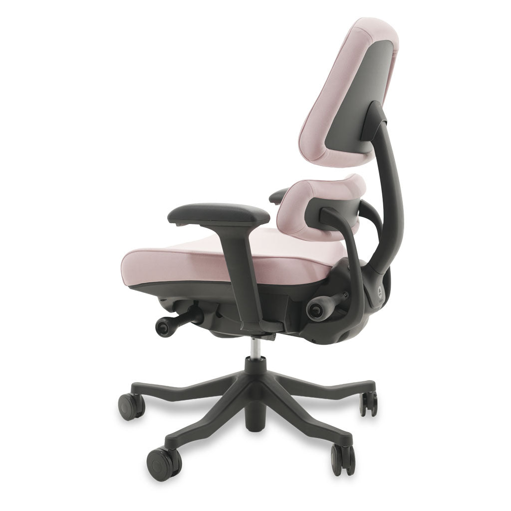 Black and pink ergonomic chair on a white background