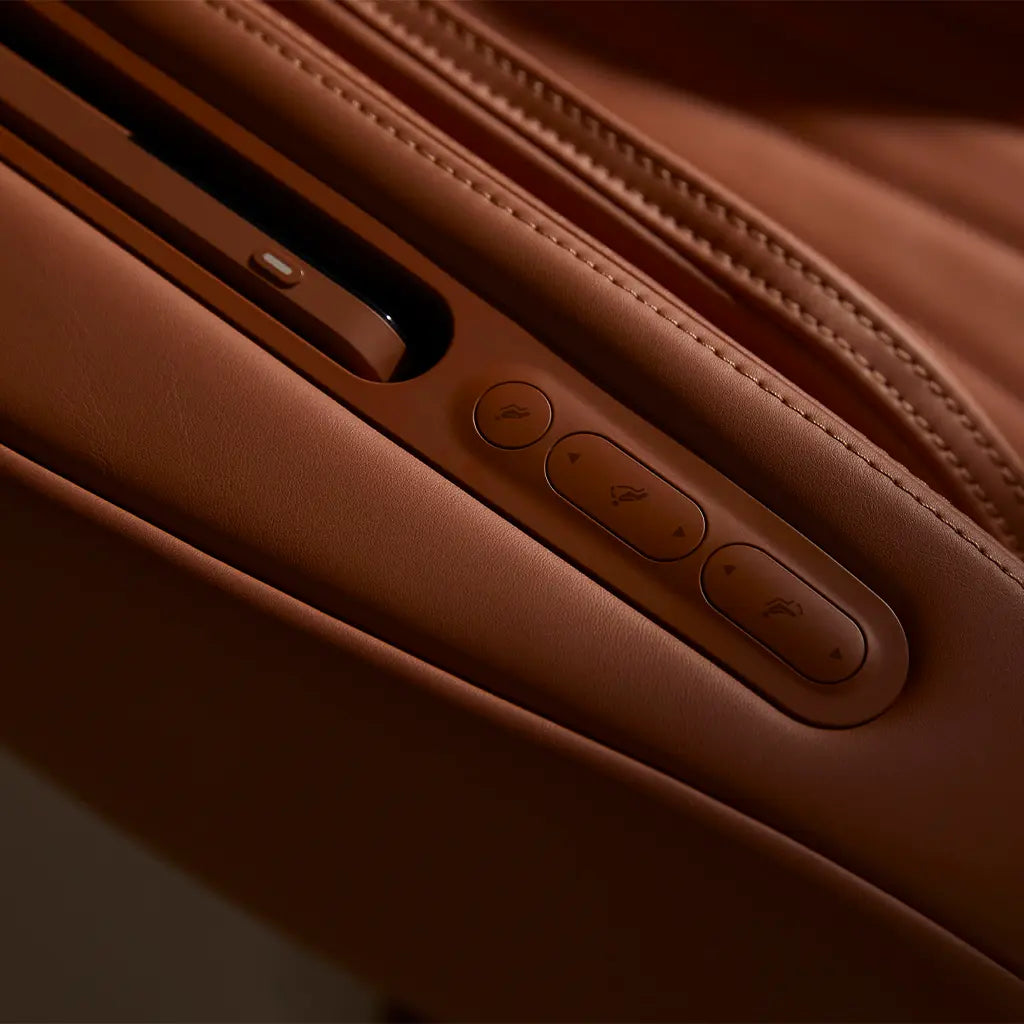 Close-up of the massage chair's quick control buttons.