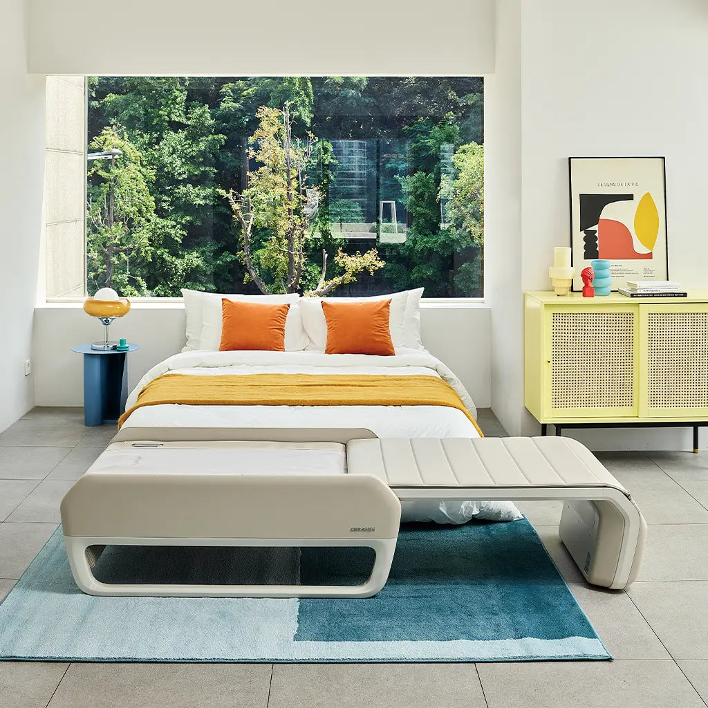 Modern bedroom with a bed, nightstand, and yellow cabinet.