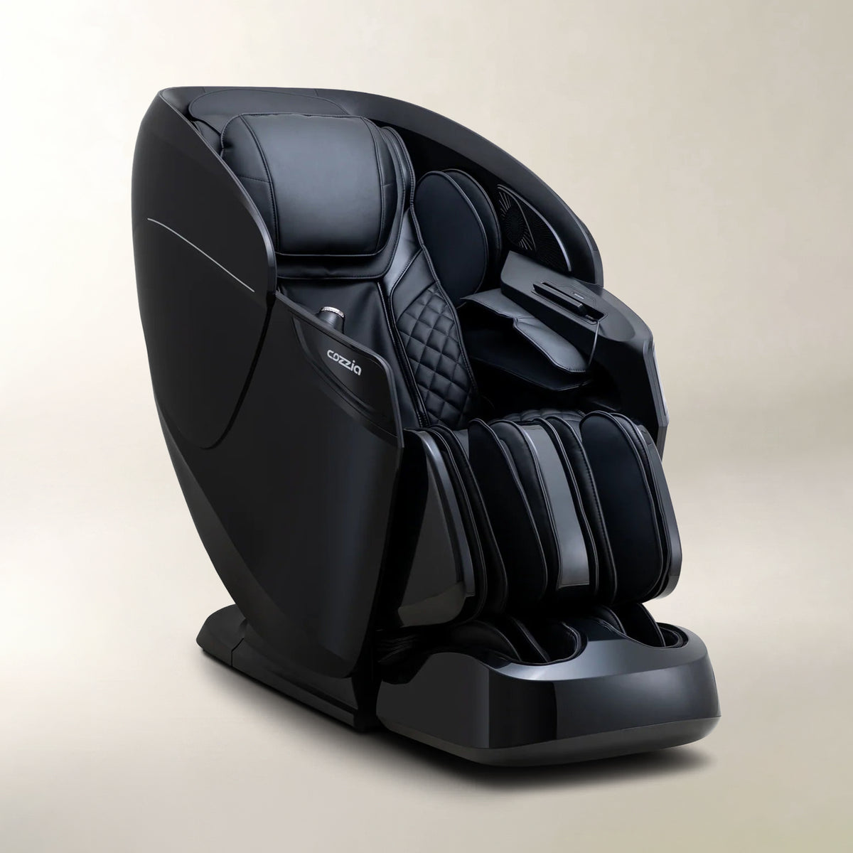 A sleek black massage chair with quilted padding and a glossy finish, shown from a three-quarters angle on a neutral beige background.