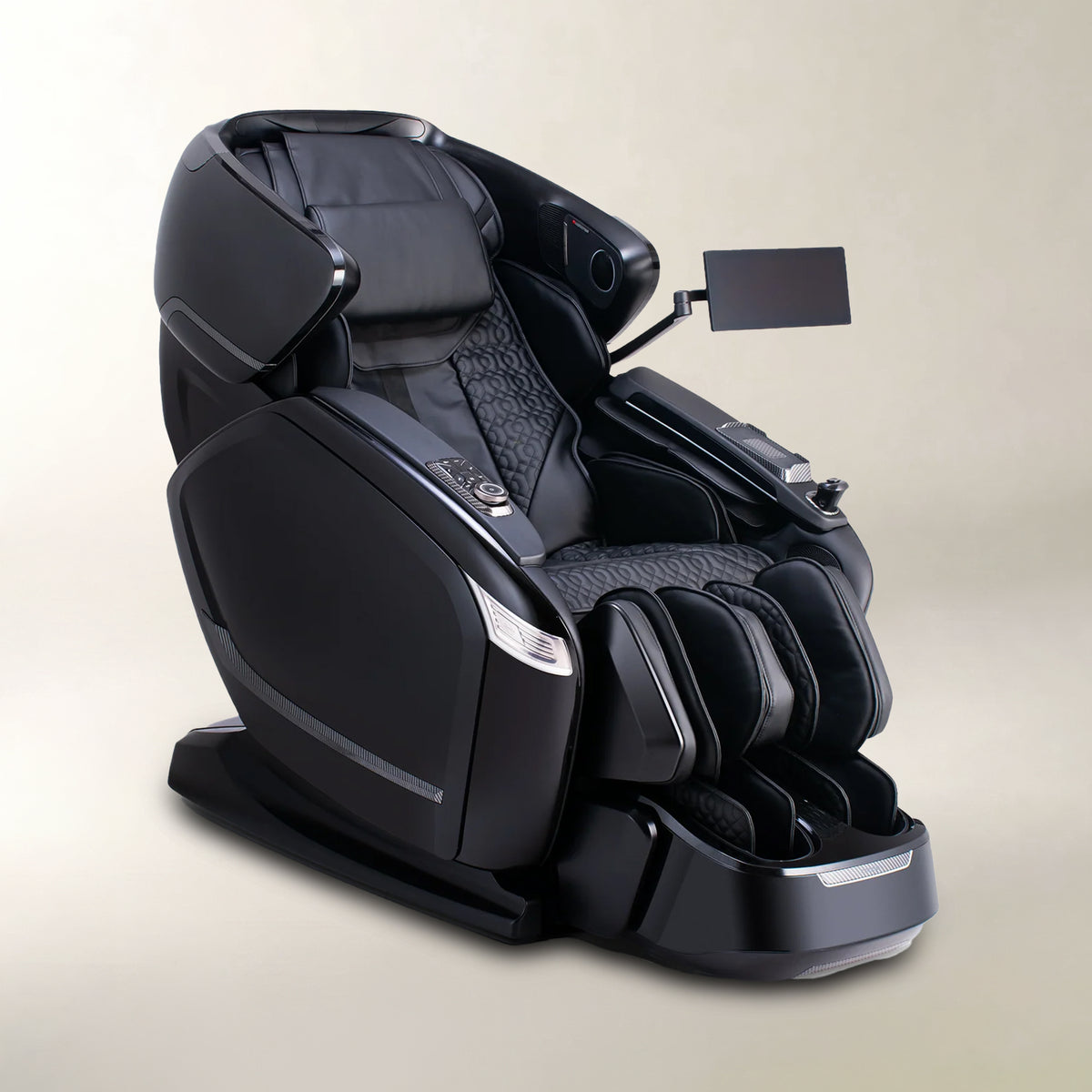 A modern black massage chair with a foot bath tray, textured patterned fabric, and an adjustable side screen, shown on a neutral beige background.