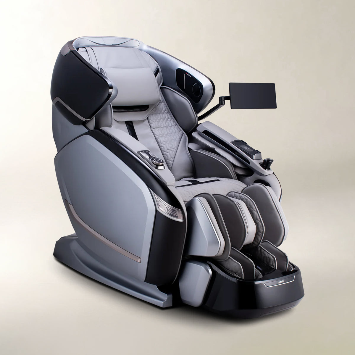 A modern gray and black automatic massage chair with a headrest, lumbar support, foot massagers, and an adjustable side screen, shown on a light beige background.