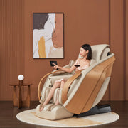 Woman relaxing in a massage chair with a wine glass, in a room with abstract art on the wall.