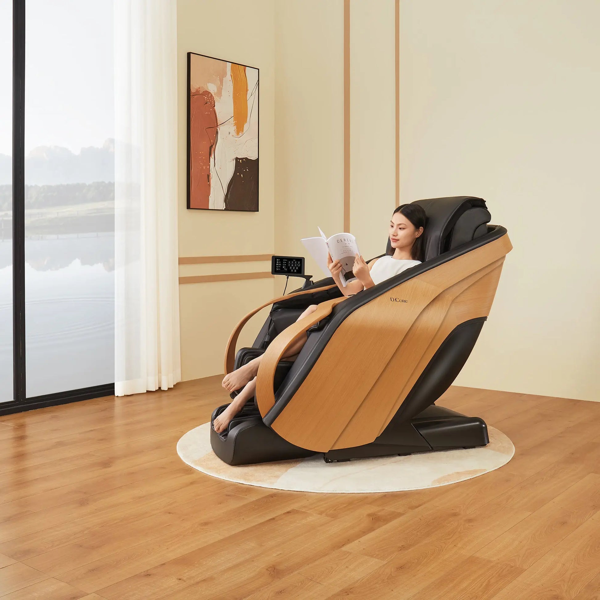 Woman relaxing in a massage chair in a modern room with a large window.