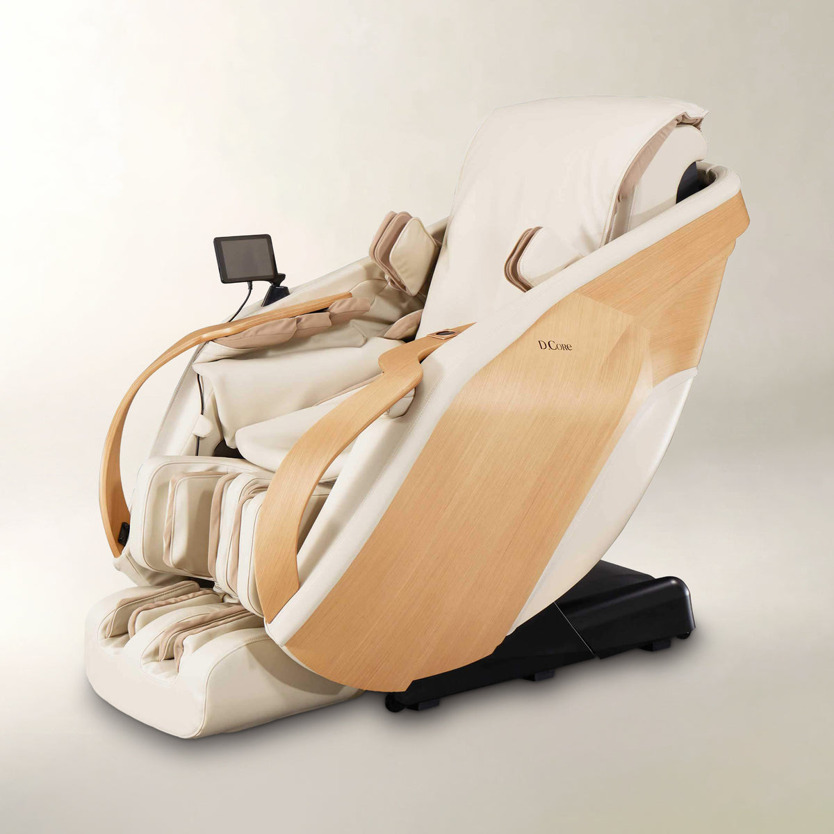 A modern Dcore massage chair in cream and light wood, shown at an angle on a neutral light gray background.