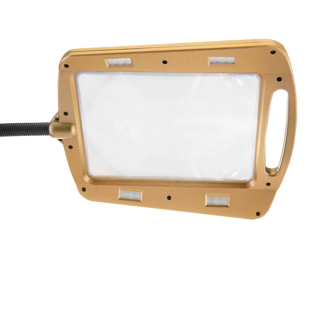 Gold magnifying lamp with a flexible neck on a white background