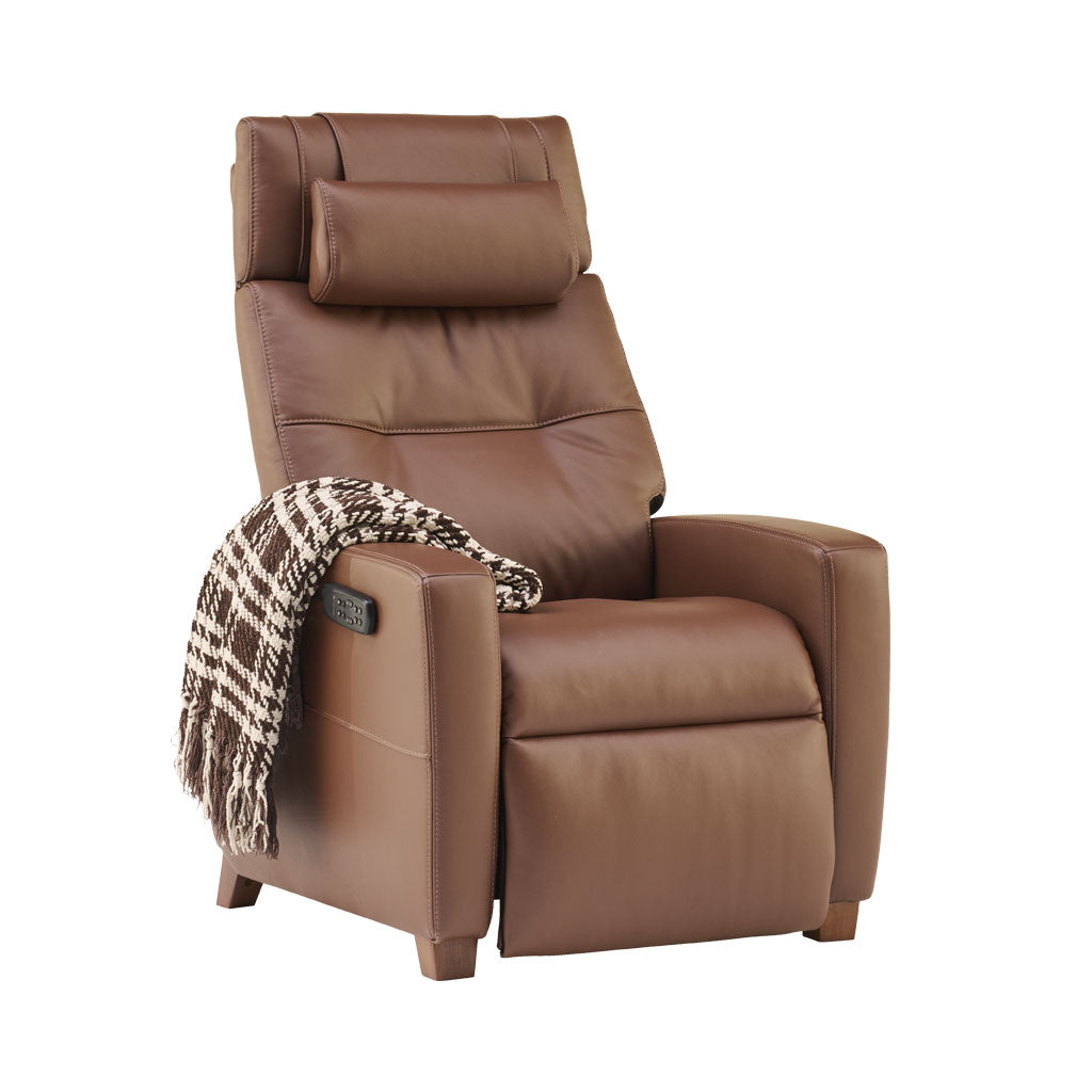 Brown leather recliner chair with a patterned blanket on a white background
