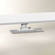 A modern wall-mounted light bar with a sleek silver and white design, shown mounted on a beige wall beneath a white ceiling.
