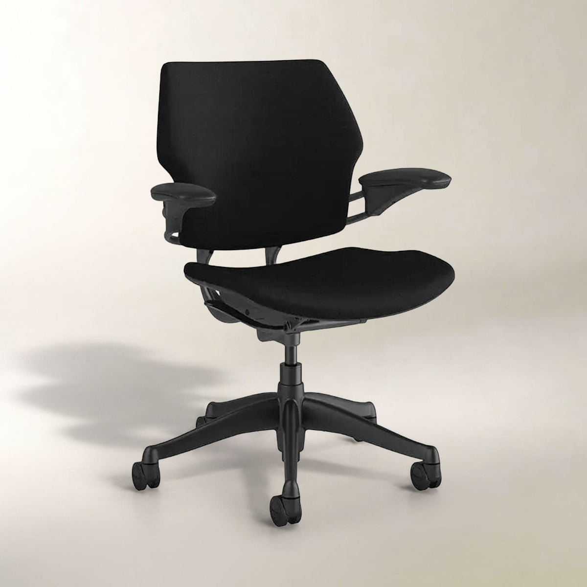 A black ergonomic office chair with a high back, adjustable armrests, and a five-wheel base, shown against a neutral light beige background.