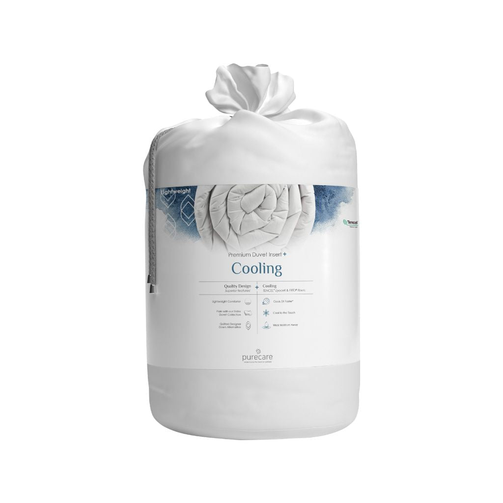 Packaged mattress topper with 'purecare' branding on a white background