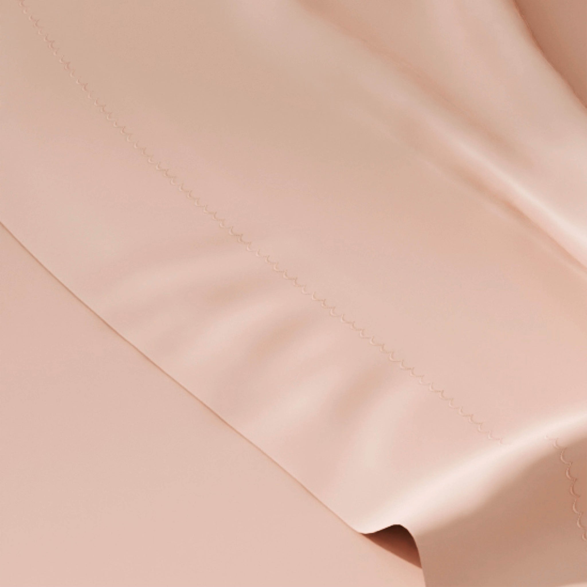 Close-up of beige fabric with a subtle texture