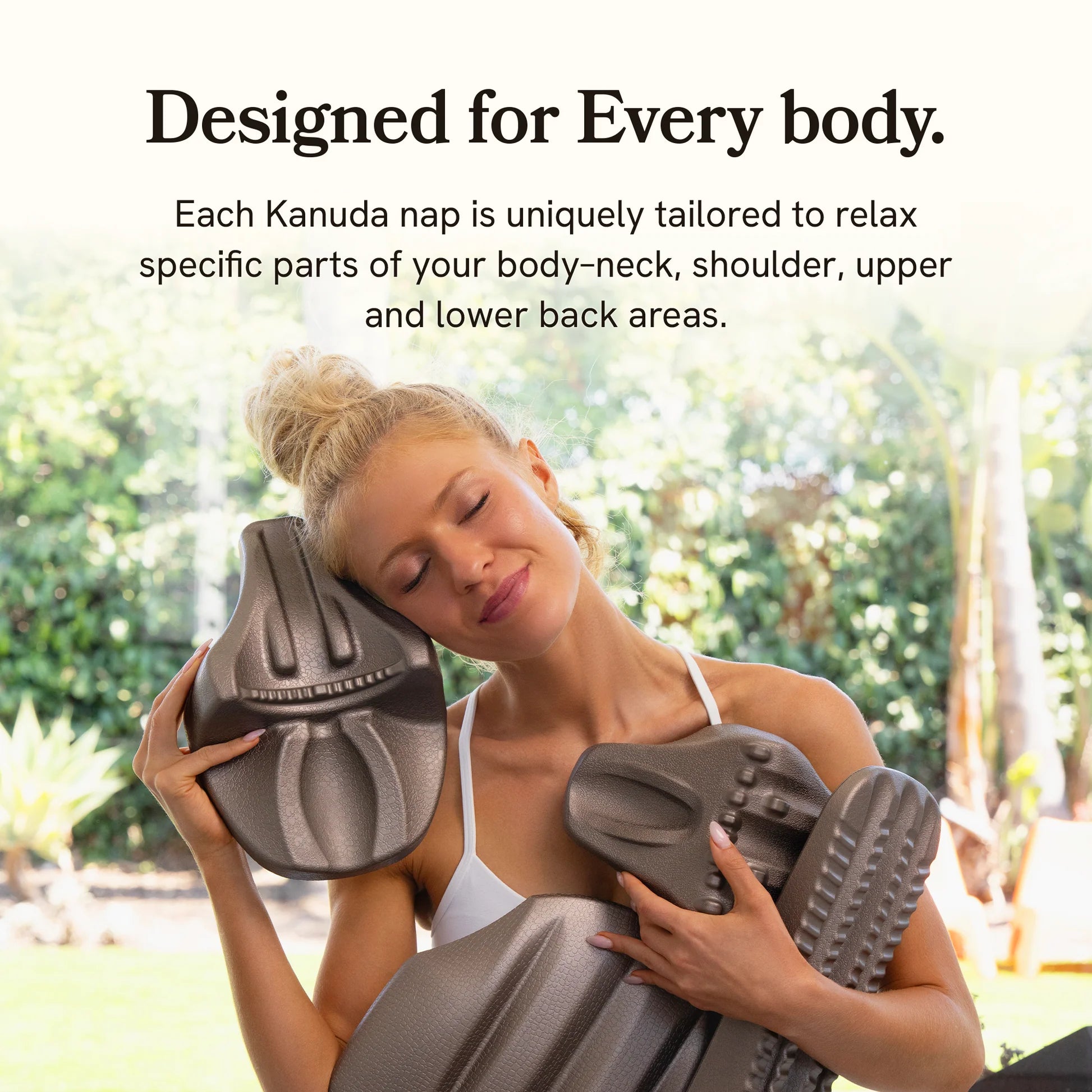 Woman holding three gray decompression stretchers with text about Kanuda nap products.
