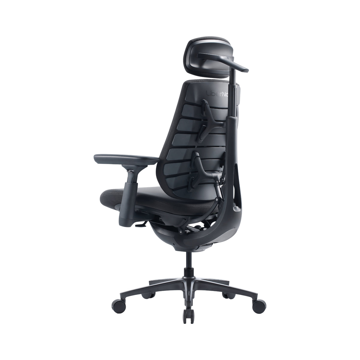 A black ergonomic office chair with a headrest, adjustable armrests, and a five-wheel base, shown from a side profile on a white background.