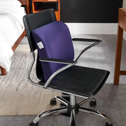 The LumbarCushion by Tempur-Pedic shown on a chair in a bedroom setting.