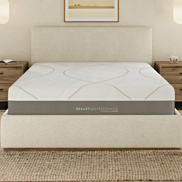 A front view of the GhostBed Massage 12" Hybrid Mattress in a bedroom setting. 