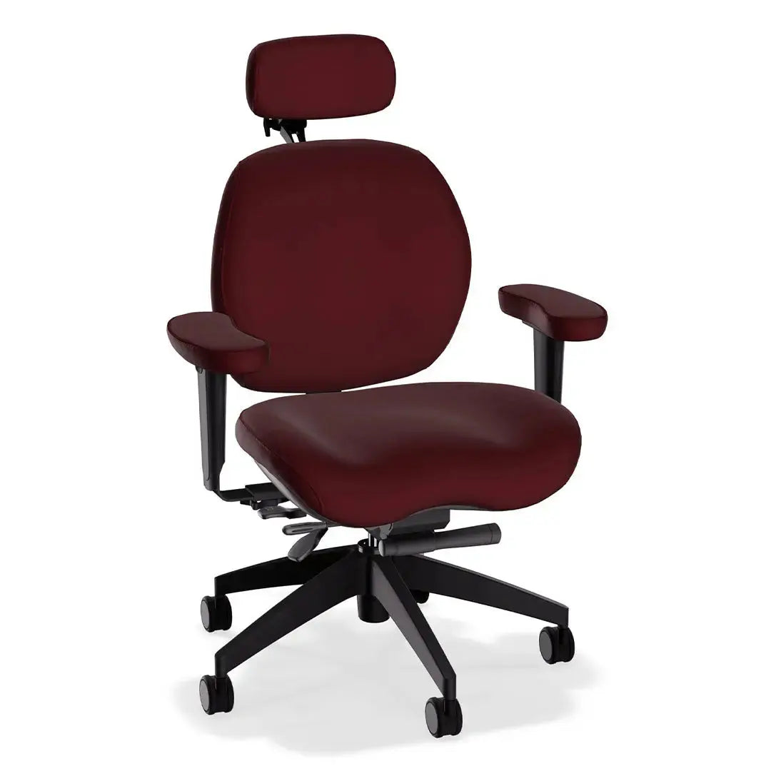 A deluxe ergonomic office chair in deep red-colored leather features a wide, cushioned seat and backrest, headrest, adjustable padded armrests, and a sturdy black five-wheel base, offering comfort and support for extended sitting.