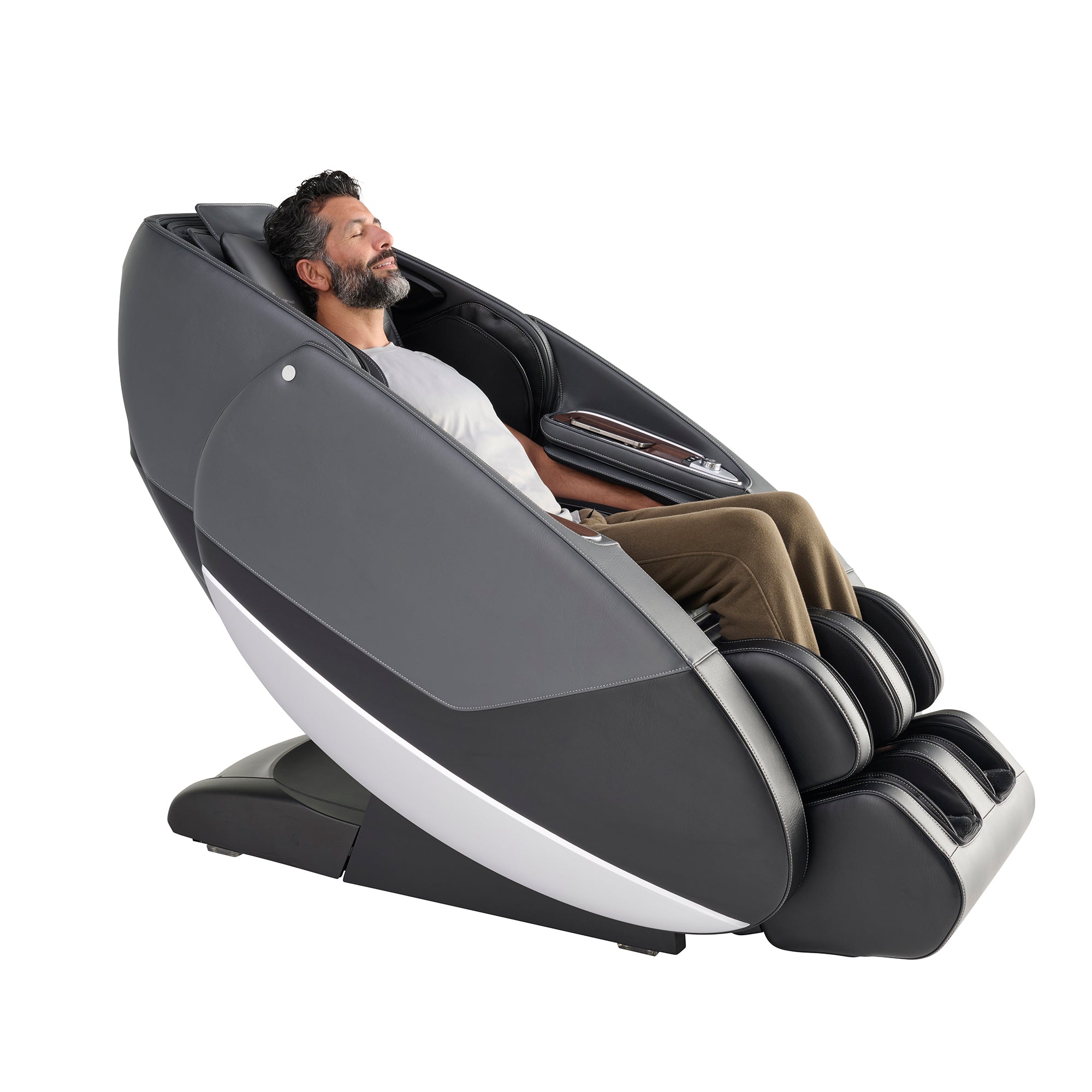 Man reclining in a gray Novo Flex massage chair, smiling with eyes closed while enjoying a full-body massage in a relaxed position against a white background.