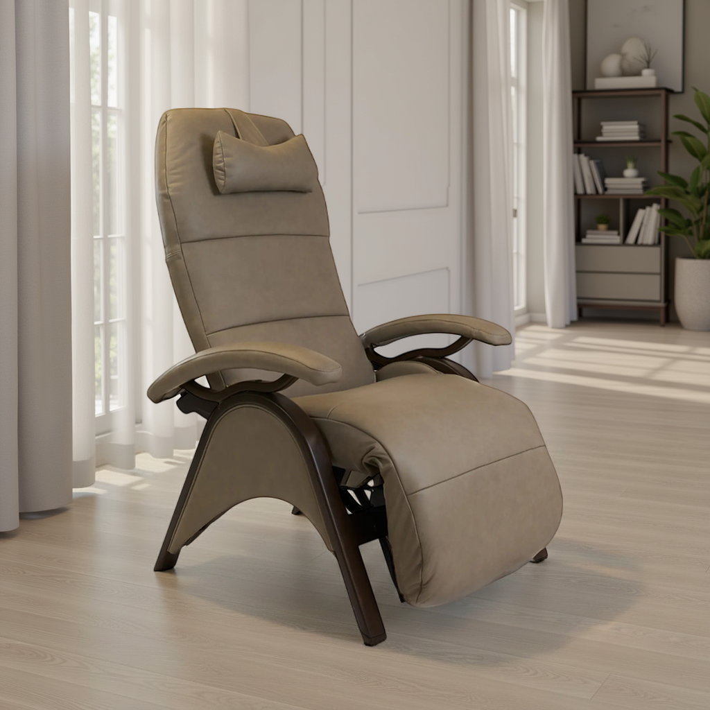 Novus Zero-Gravity Recliner in Smoke upholstery with Walnut base, shown in a bright modern living room setting with light oak flooring and sheer white curtains.