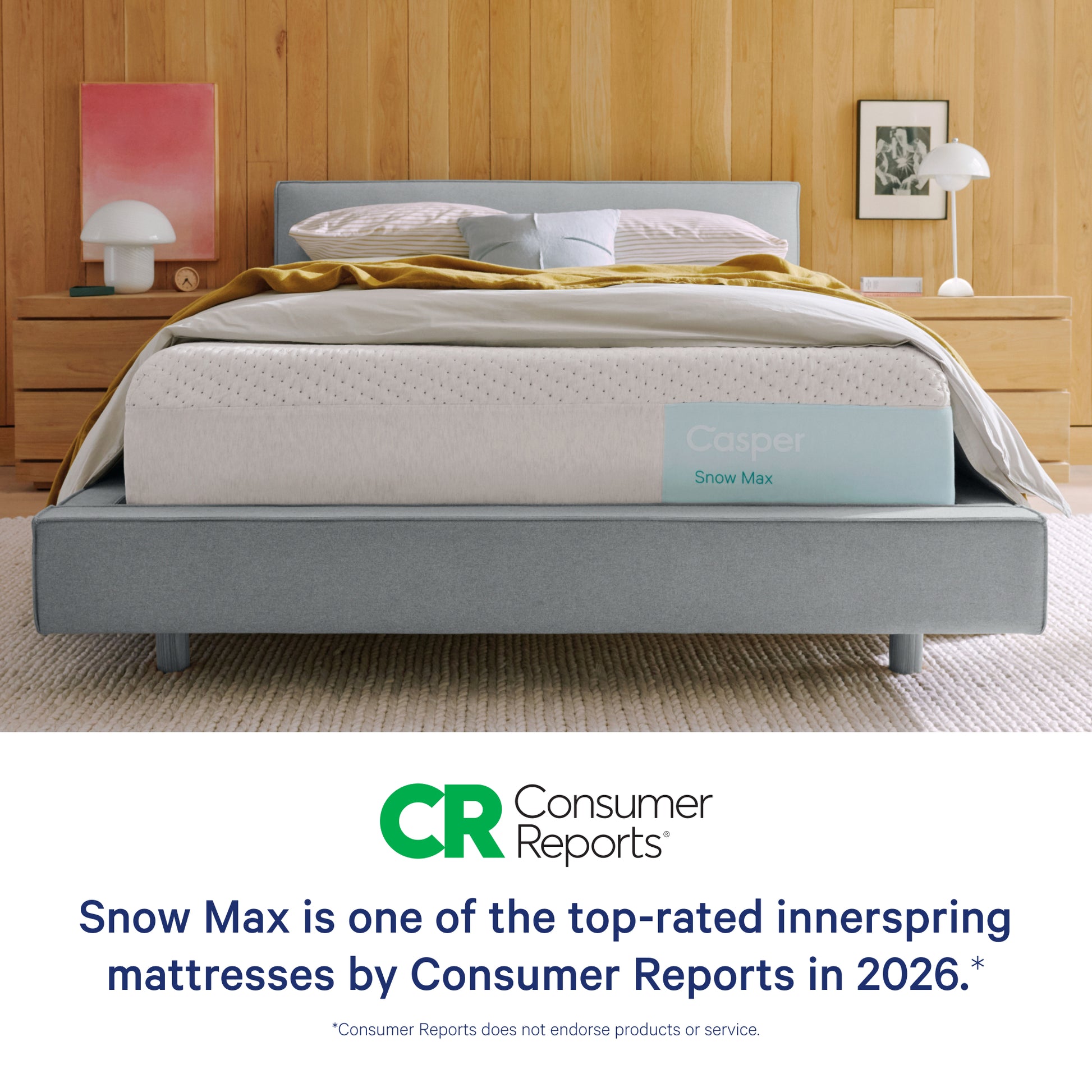 Mattress with 'Snow Max' branding in a bedroom setting, featuring Consumer Reports logo.