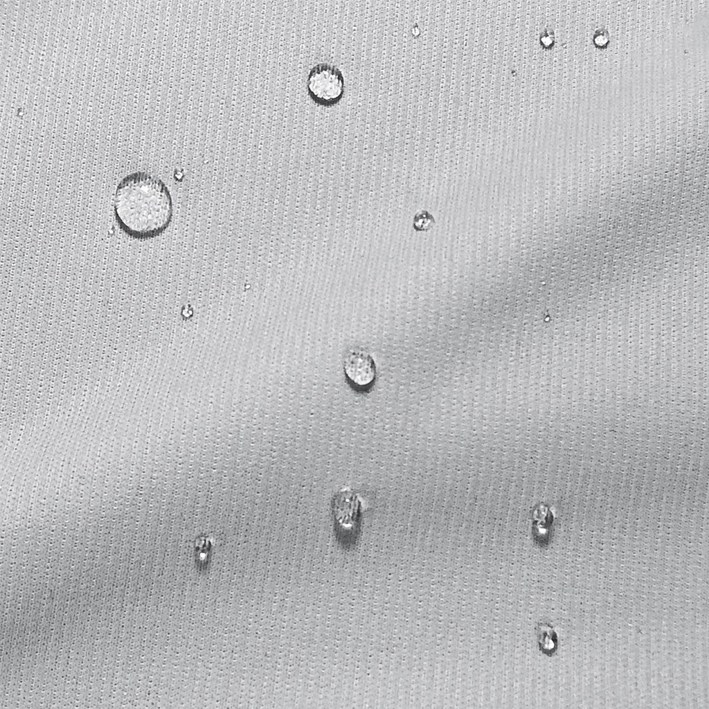 Close up of water resistant white mattress protector