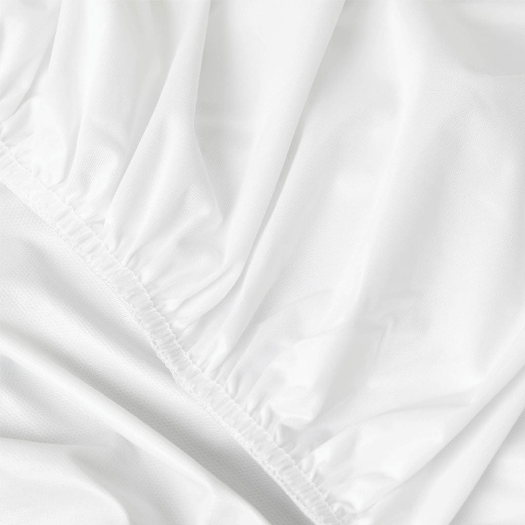 Close-up of white mattress protector