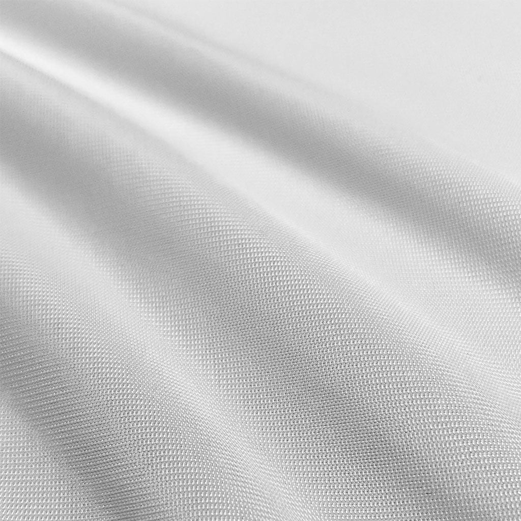 Close-up of white fabric with subtle texture