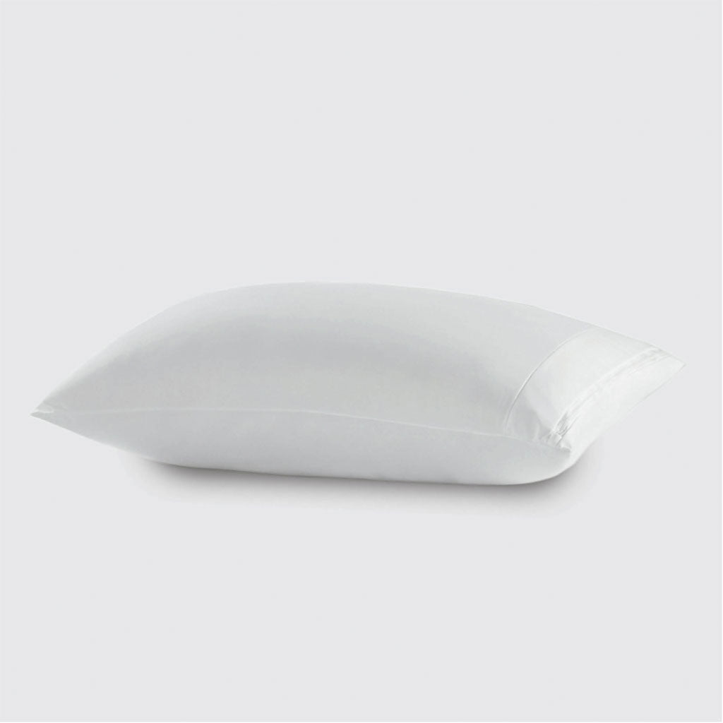 White pillow on a light gray background