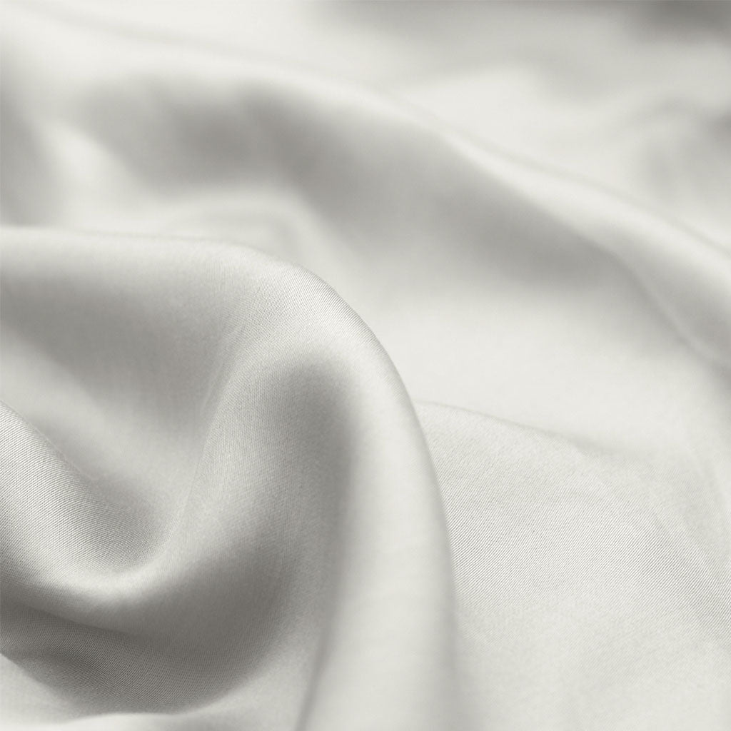 Close-up of white fabric with folds