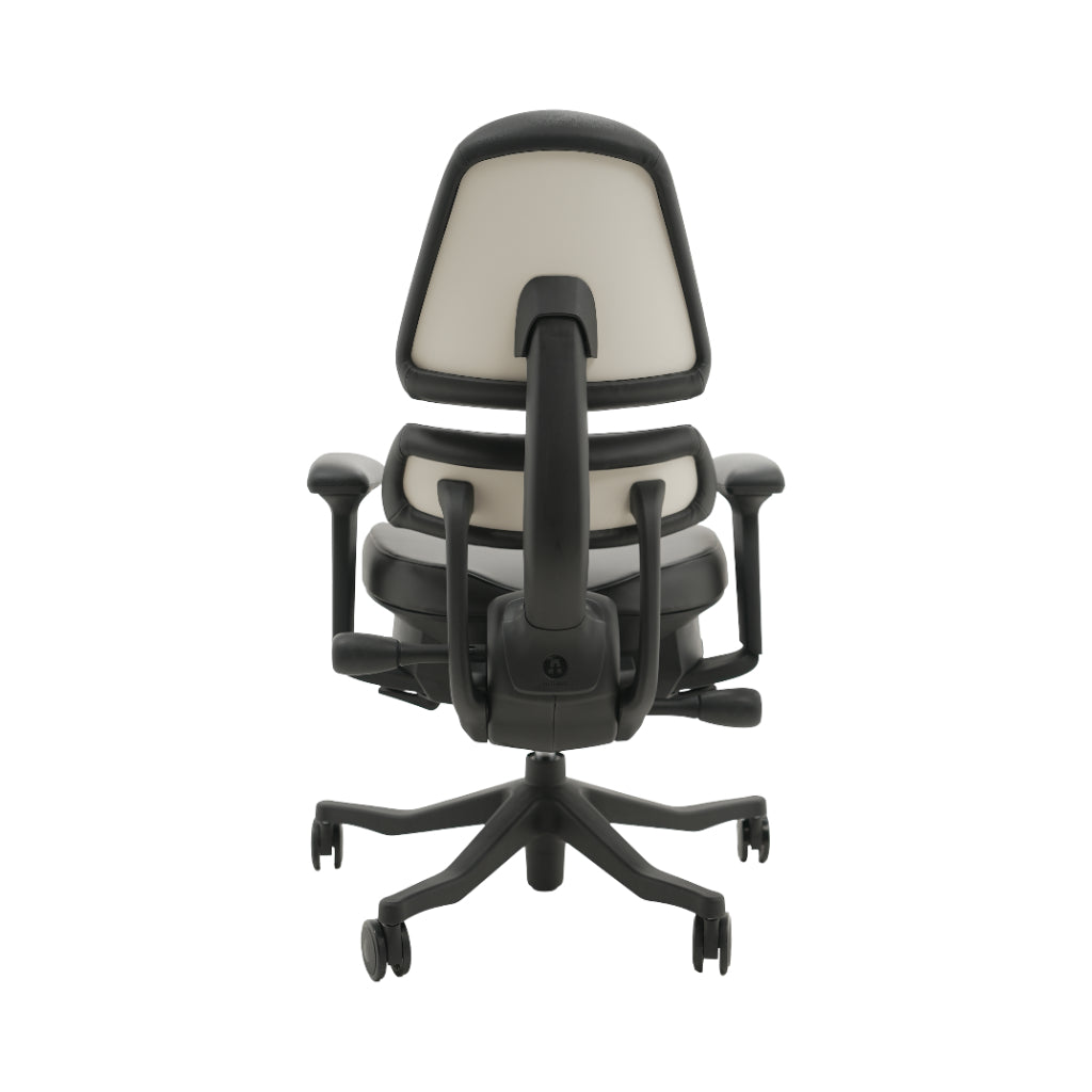 An ergonomic office chair with a high back, adjustable armrests, and a four-wheel base, shown from a rear angle on a white background.