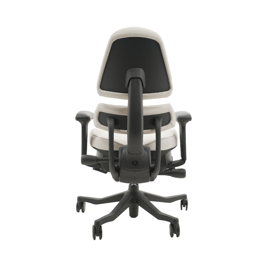 An ergonomic office chair with a high back, adjustable armrests, and a four-wheel base, shown from a rear angle on a white background.