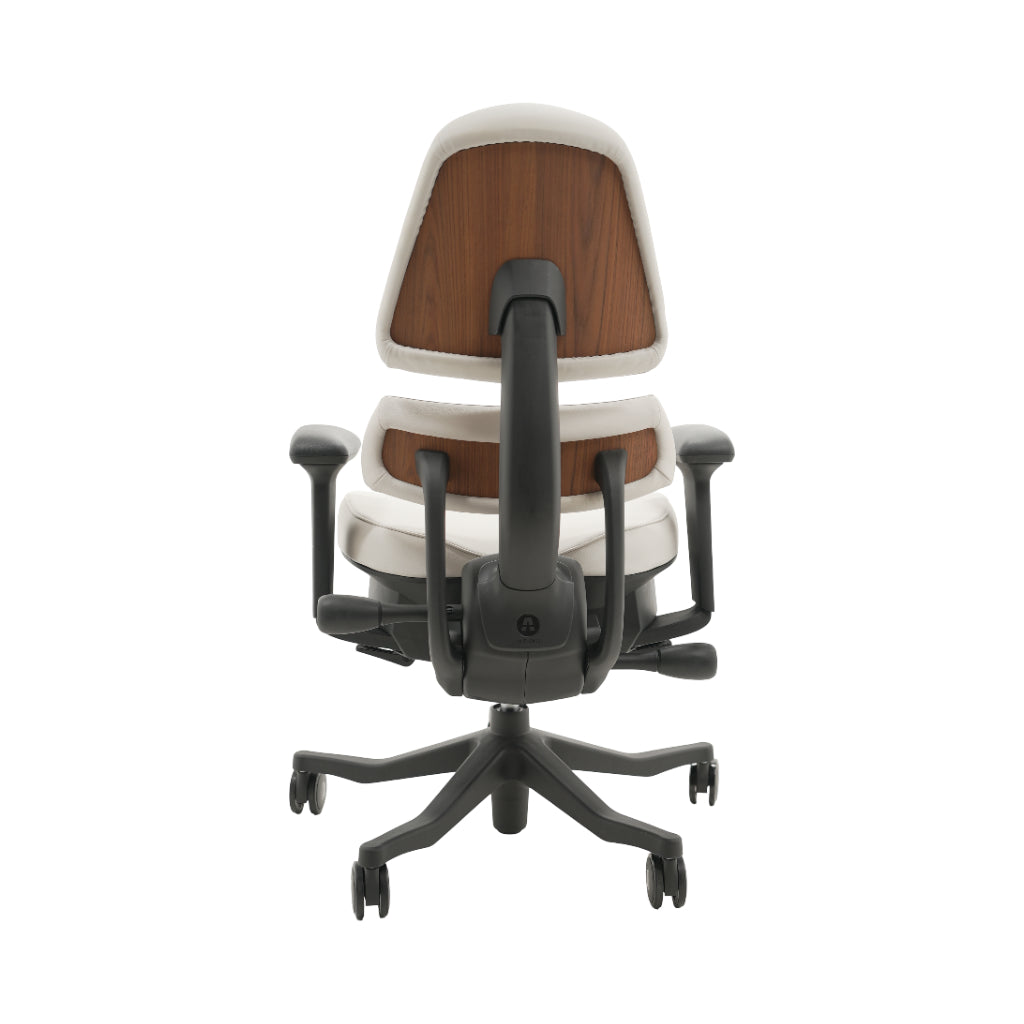An ergonomic office chair with a high back, adjustable armrests, and a four-wheel base, shown from a rear angle on a white background.