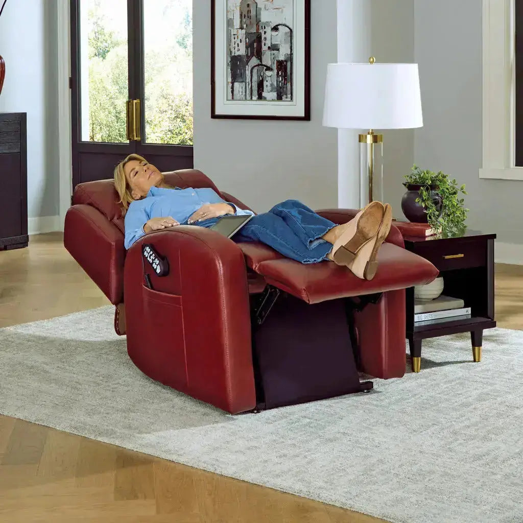 Woman resting with eyes closed in the fully reclined Sunrise PR134 Zero Gravity Lift Recliner, legs elevated for zero gravity comfort