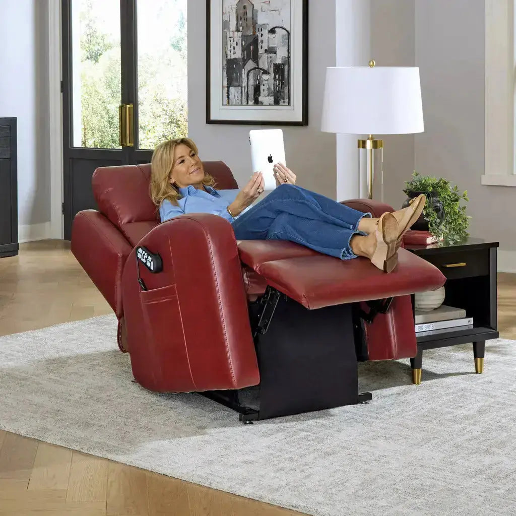 Woman reclining and using a tablet in the Sunrise PR134 Zero Gravity Lift Recliner, legs elevated for ergonomic comfort
