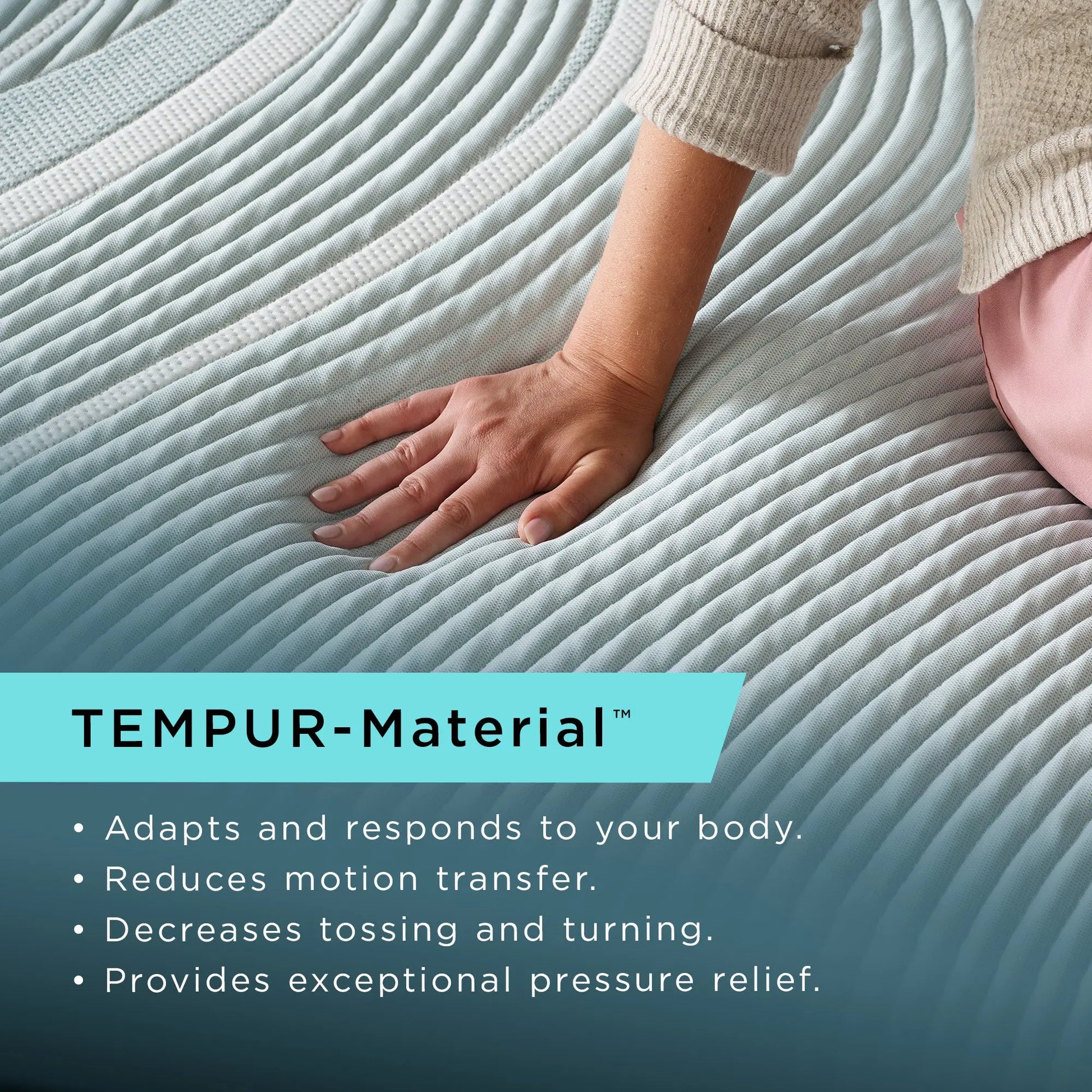 A woman sitting with her hand on the TEMPUR-ProAdapt® 12" Soft Mattress 
