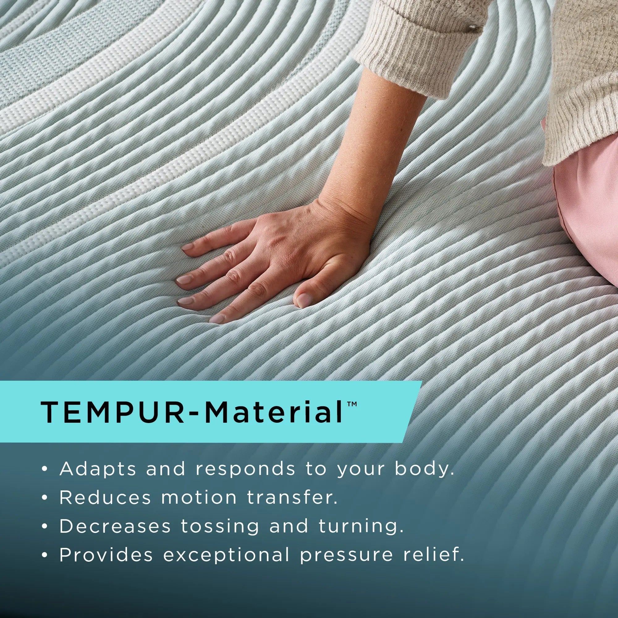 A woman sitting with her hand on the TEMPUR-ProAdapt® 12" Soft Mattress 