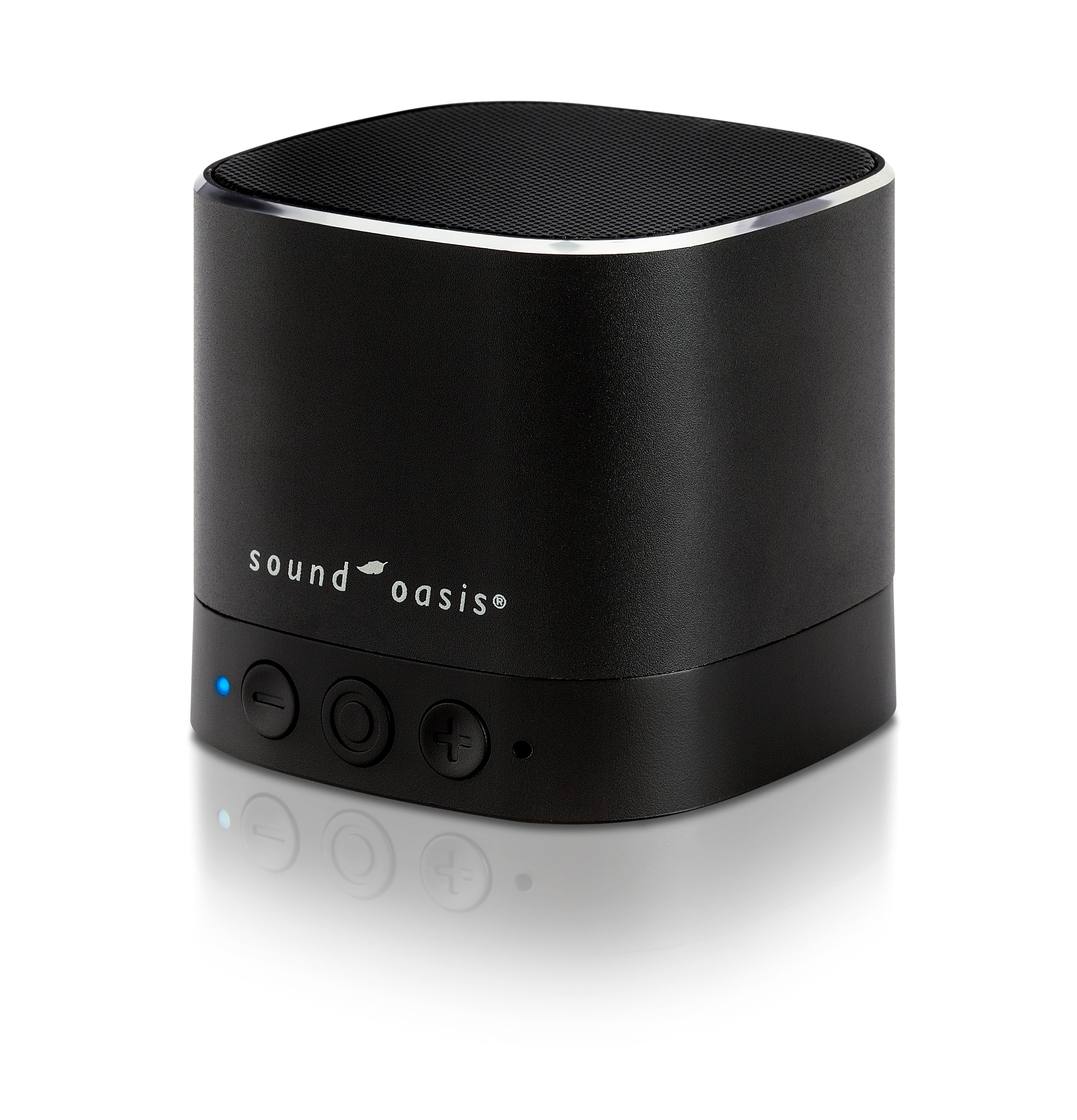 A black Sound Oasis portable Bluetooth speaker with a cylindrical design, featuring a textured top grille, a silver accent ring, and three control buttons on the front, set against a clean white background with a soft reflection.