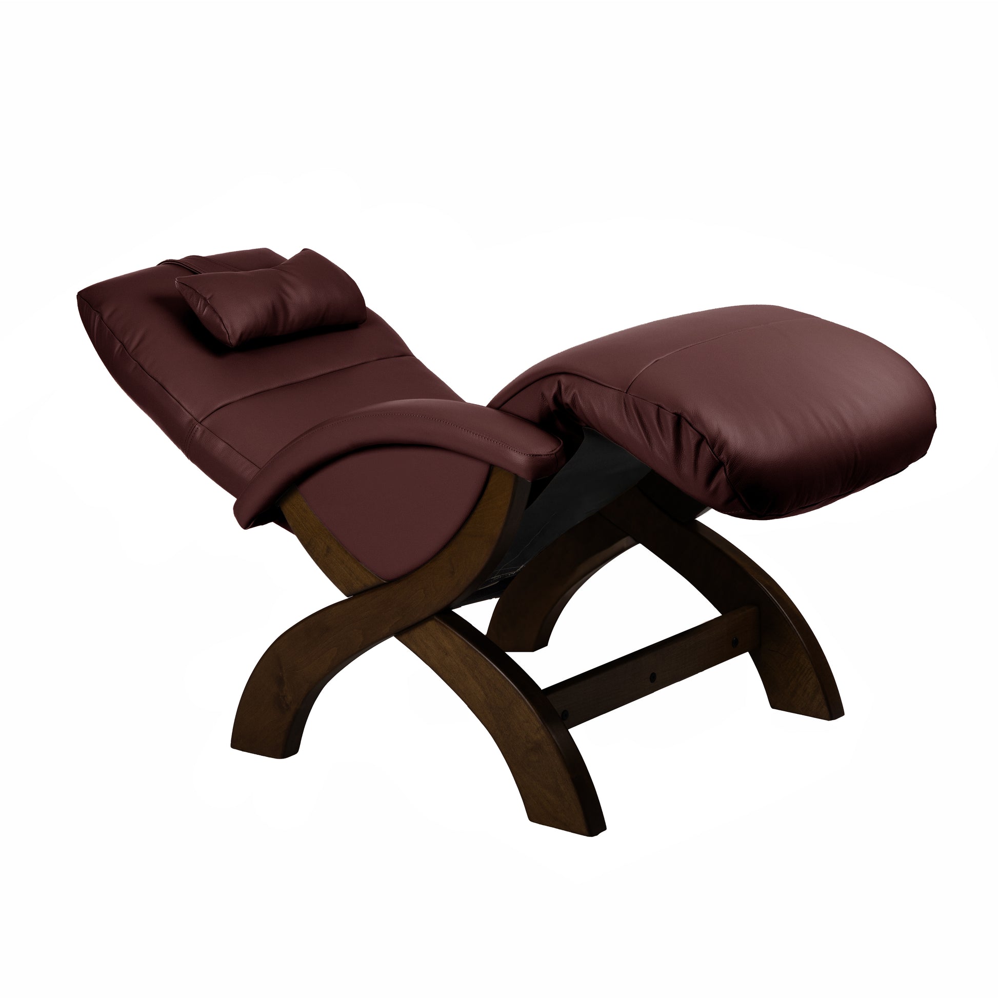 Deep red leather recliner chair on a white background