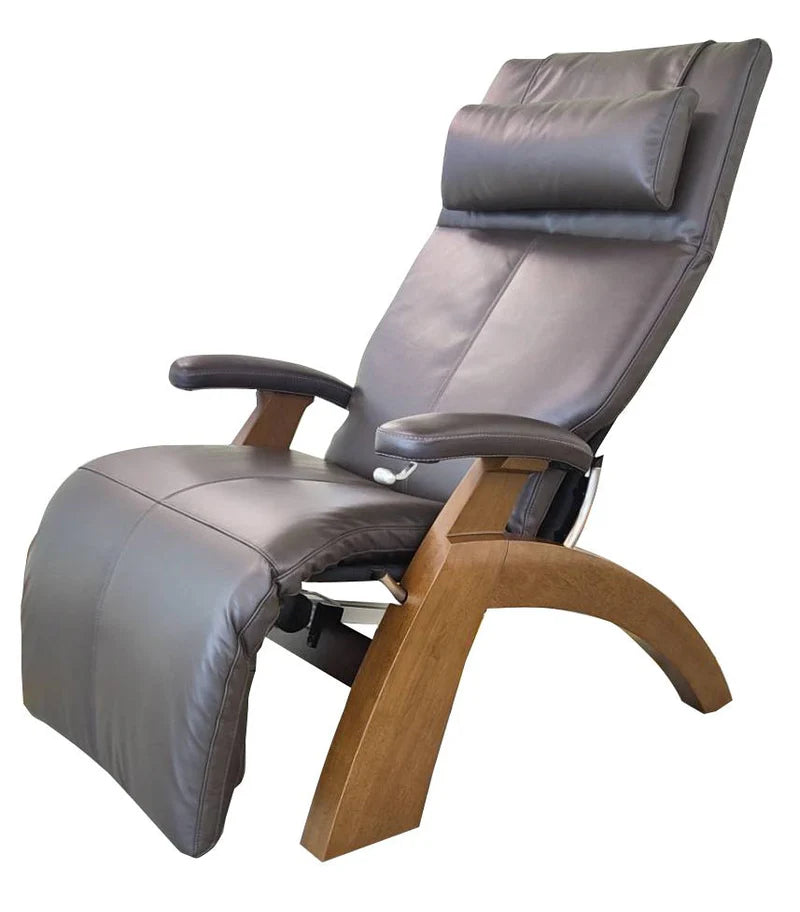 Espresso leather recliner chair with wooden armrests on a white background