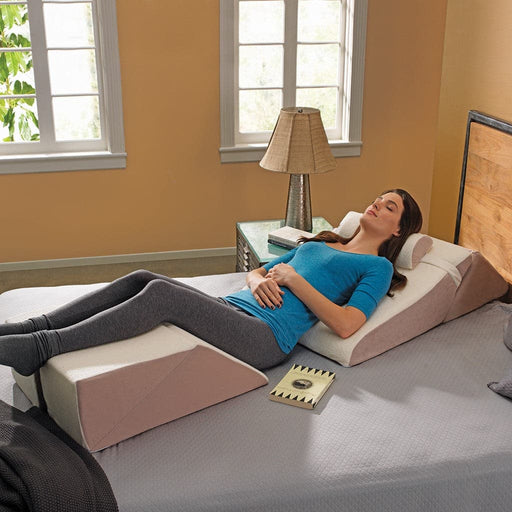 Women reading while supported by the ContourSleep Bed Wedge System